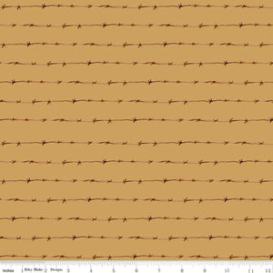 Ride the Range Fence Gold Cotton Fabric