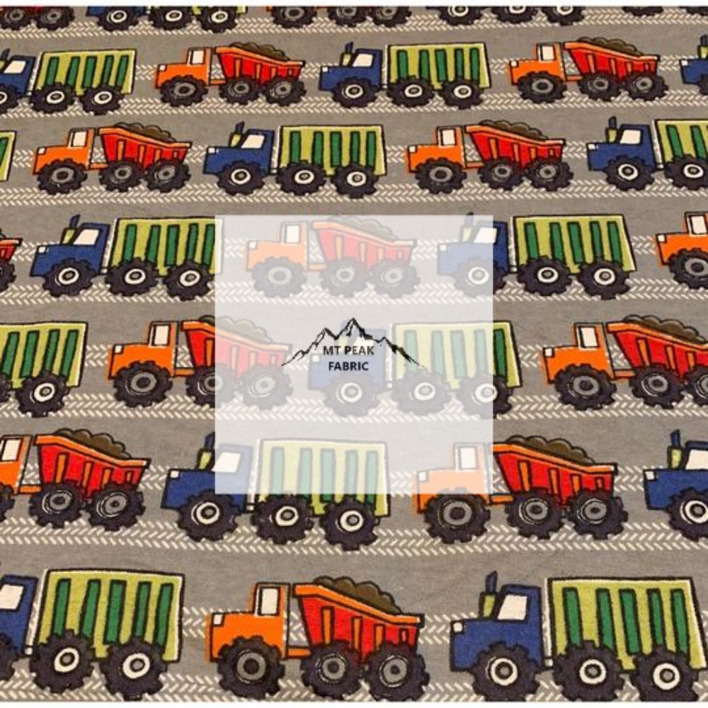 Great for any fan of Heavy Equipment. This 100% flannel/cotton fabric is perfect for quilting, apparel, and many other sewing or crafting projects. This print features heavy equipment in a line  on a grey background. Sold by the yard and half yard increments.