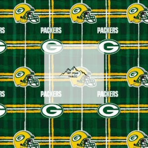 Great for any fan of Green Bay Packers. This 100% flannel/cotton fabric is perfect for quilting, apparel, and many other sewing or crafting projects. This print features "G", "Packers", and helmets on a yellow and green plaid background. Sold by the yard and half yard increments.