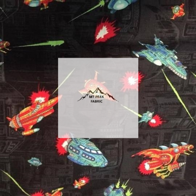 Great for any project that is Space themed. This 100% cotton fabric is perfect for quilting, apparel, and many other sewing or crafting projects. This print features spaceships on a black background. Sold by the yard and half yard increments.