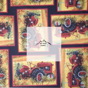 Great for any project that is tractor themed. This 100% cotton fabric is perfect for quilting, apparel, and many other sewing or crafting projects. This print features tractors on a black background. Sold by the yard and half yard increments. 