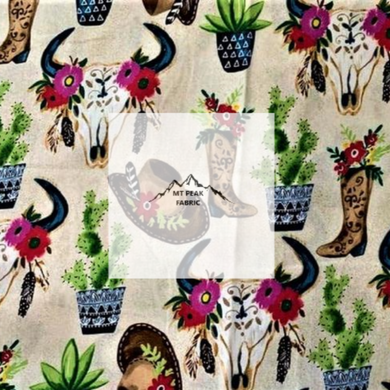 Great for anyone who loves western. This 100% cotton fabric is perfect for quilting, apparel, and many other sewing or crafting projects. This print features a collage of cowboy hats, and skulls with flowers on a white background. Sold by the yard and half yard increments. 