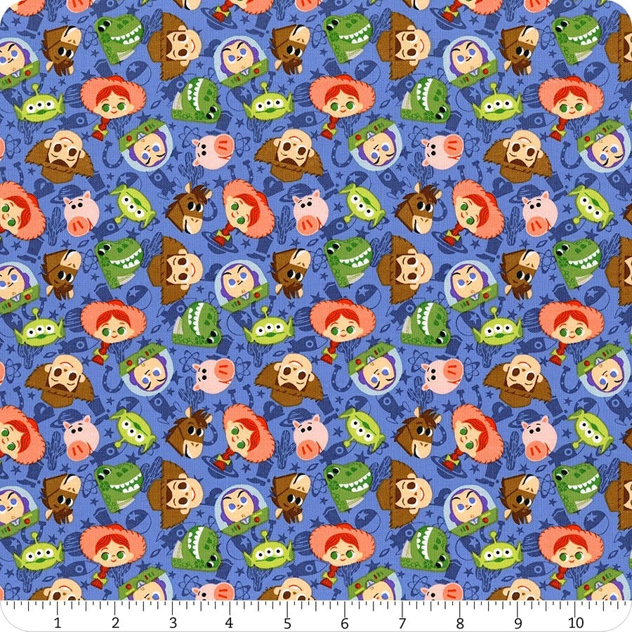 Toy Story Faces Cotton Fabric